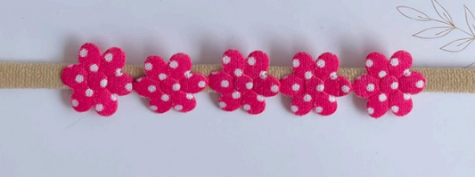 Nairobi flor fucsia lunares blancos